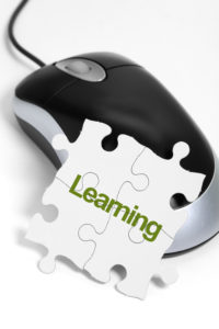computer mouse and Puzzle, business concept of Learning